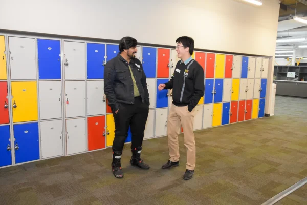 2 Alumni touring the school