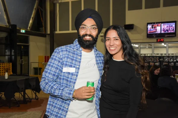 2 Alumni posing for a photo